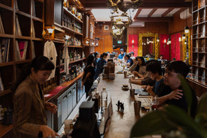 Guests at the Corner Corner Singapore x EVERHĀOS pop-up, surrounded by vinyl records